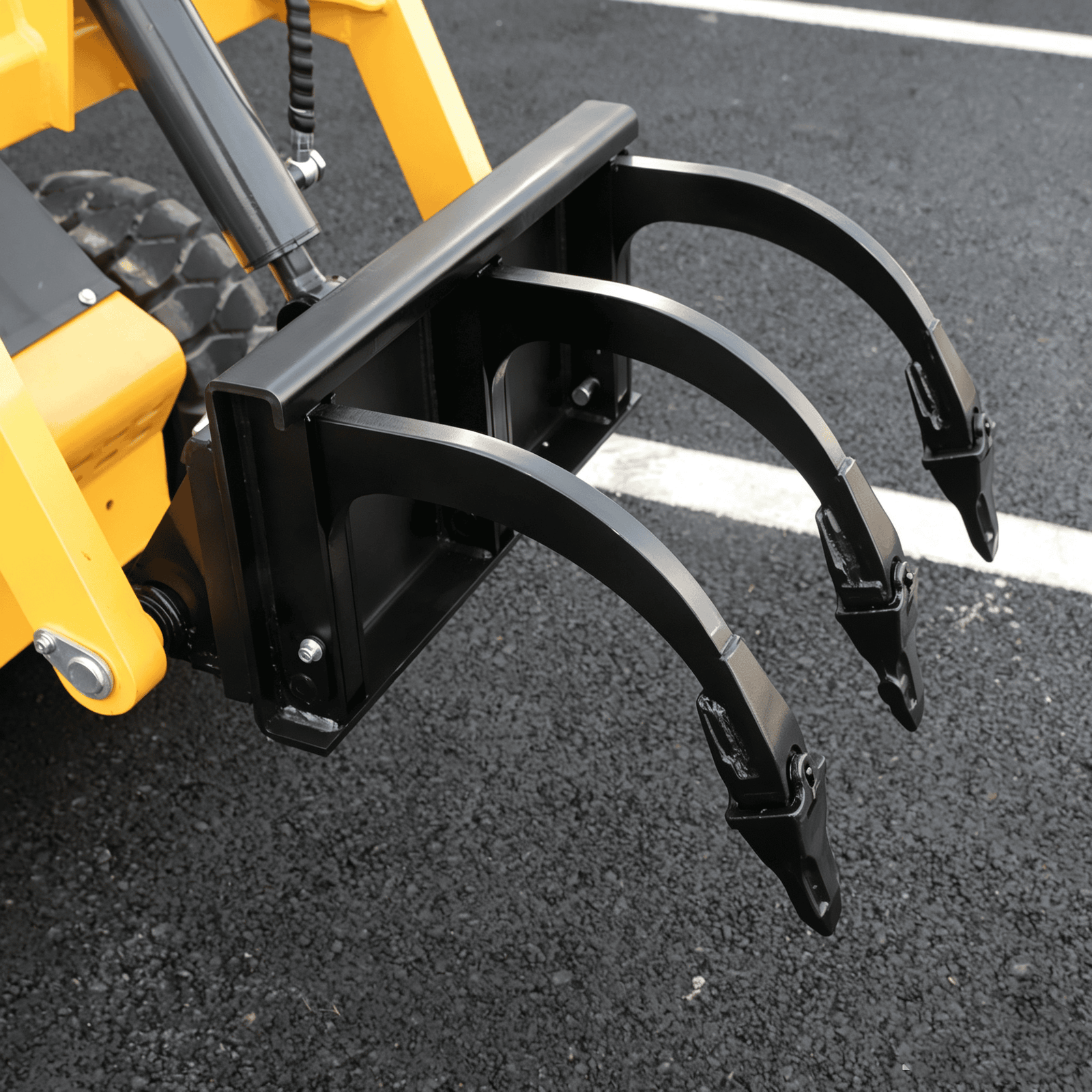 Leveler / Ripper for skid steer loader